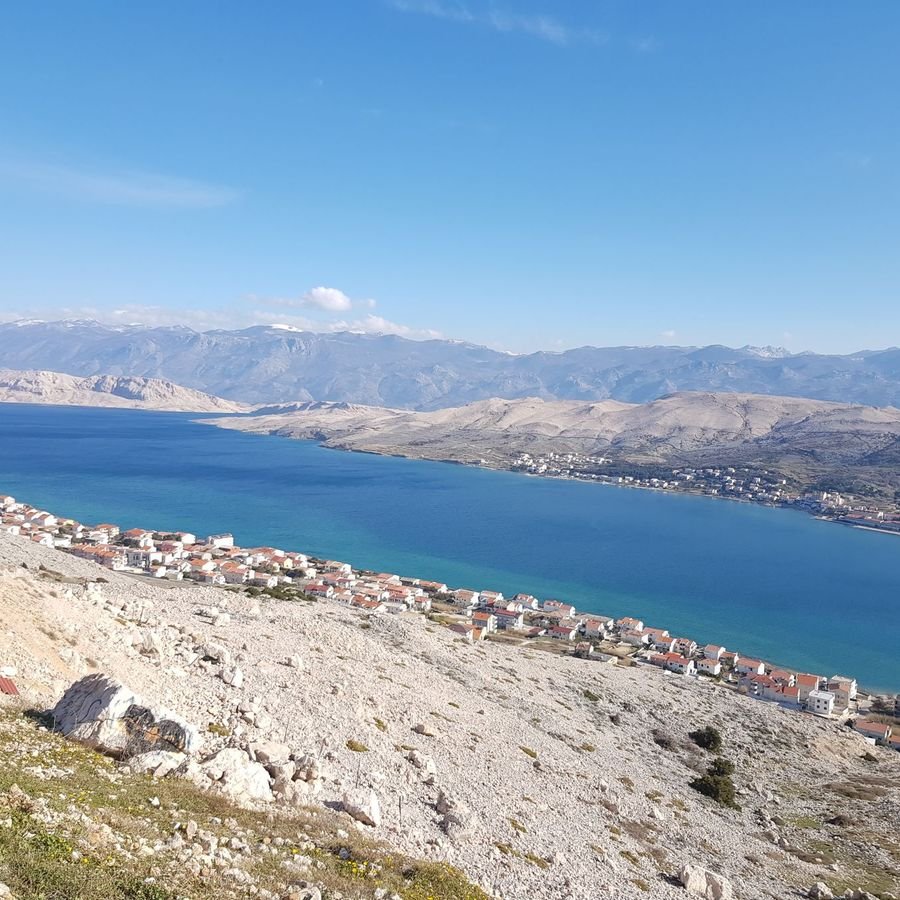 The bare limestone hills and turquoise bays of Pag Island near Zadar